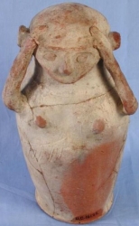 Dynasty 11, woman shaped vessel in mourning UC16126 - Copyright of the Petrie Museum of Egyptian Archaeology, UCL
